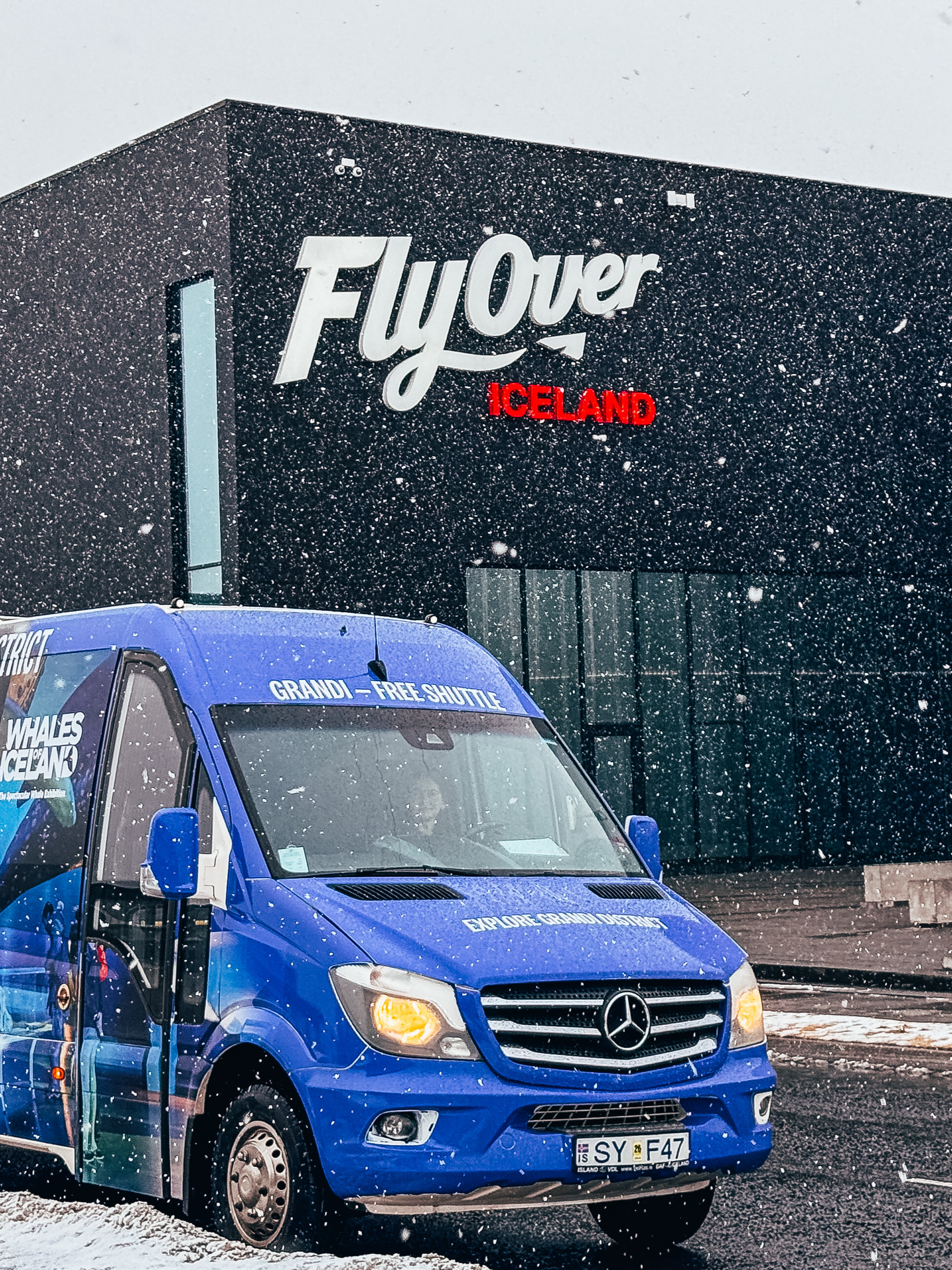 A glacier between tall mountains.